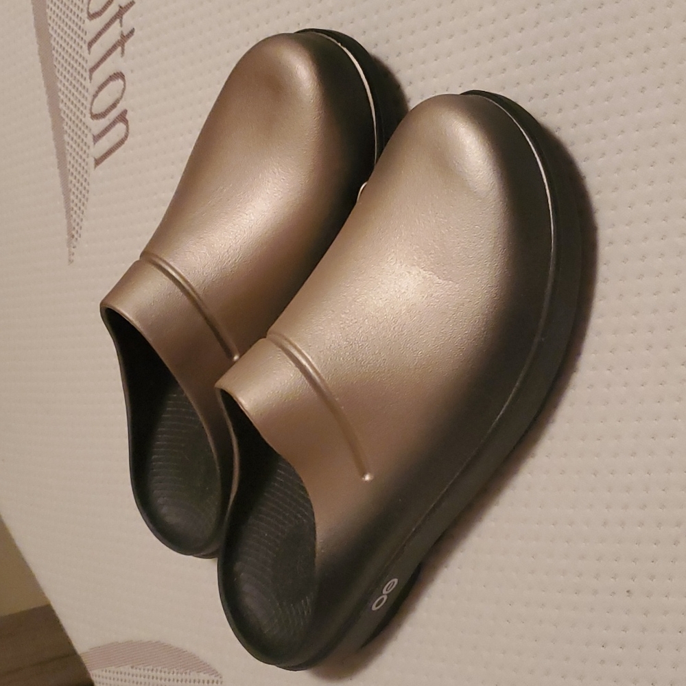 Gold Oofos clogs